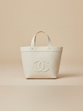 Chanel Cream Tote Bag with Textured Canvas and Iconic CC Logo